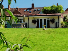 The Nook located in a beautiful garden setting with parking